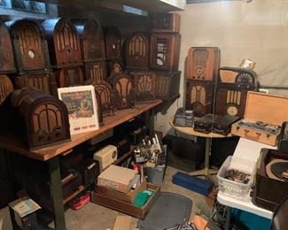 35 of almost 100 antique tube radios throughout the house Tube radios, chassis, tube testers, record players