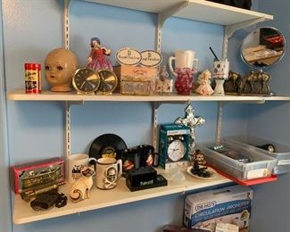 Vintage alarm clocks, tin toys, Royal Daulton, brass book ends, novelty items, vintage flashlights, batteries