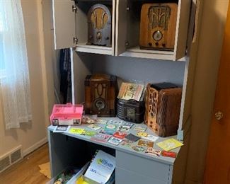 Desk available for purchase prior to the sale $30. Pickup any time after the first day of the sale. Office supplies, tube radios, vintage skeleton keys