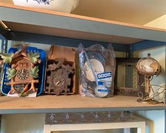 Cuckoo clocks, antique slag glass lamp