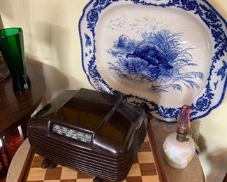 Tube radio, 19th century turkey platter, chess set, oil lamp