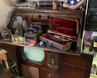 Antique Du Mont TV will be free to a good home. Trumpet, antique phones, fan, bull horns