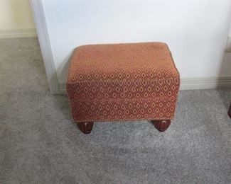 Ottoman on bun feet.