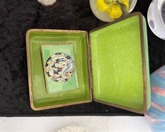 Cigarette box and match box.