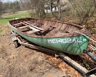 Very vintage wooden ribbed boat. Was stored in a barn for years and is in great condition. Trailer comes with the boat.