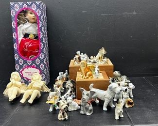 Dogs, Doll, And Angels