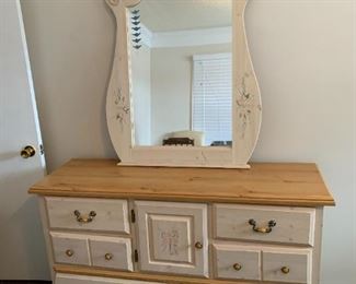 #15	Kathy Ireland Collection Dresser w/mirror - w/6 drawers & 1 door (as is finish) - 54x16x32  Mirror - 32x44	 $75.00 			
