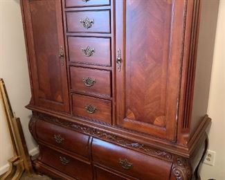 #18	AICO Armoire w/2 doors  w/8 doors w/shelves - 55x22x28-65  (2 pc.)  (as is chip out of back)	 $75.00 			
