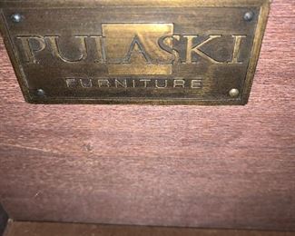 #26	Pulaski Brand Dark Brown Dresser w/8 drawers (drawers need fixing, one drawer chipped) - 62x19x40 -Beveled Mirror - 42x38	 $50.00 			
