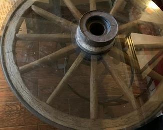 #42	vintage Wagon Wheel w/cast iron Base w/glass top - 36x18.5	 $200.00 			
