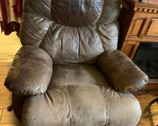 #44	Leather Recliner (as is condition) w/continuous Foot	 $75.00 			
