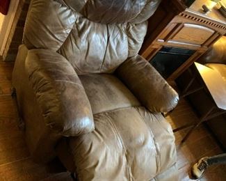 #44	Leather Recliner (as is condition) w/continuous Foot	 $75.00 			
