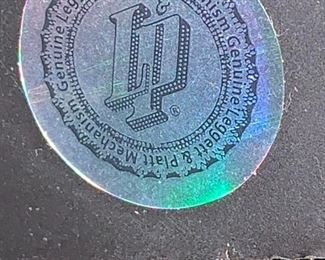 #52	Brown Leather Double Recliner w/center wedge & Cupholders w/continuous legs - 83"Long	 $200.00 			
