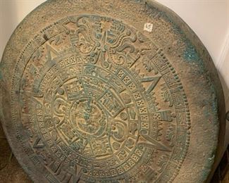 #65	Green Metal Aztec Wall Hanging  Sun- 25" Round	 $45.00 			
