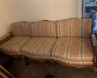 #69	French Provincial Sofa w/lattice Side Arms and wood Back and legs - 87"Long	 $120.00 			
