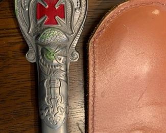 #98	Ant. Ceremonial Knights Temper w/Scabbard and Leather Sword Carrying Case.  Bears owner inscription 	 $275.00 			
