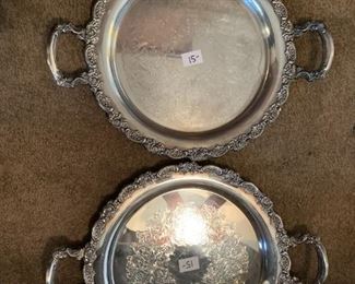 #106	Set of 2 Heavier Silverplate Platters	 $30.00 			
