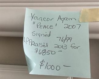 #86	Art	Yaacov Agam "Peace" 2007  signed 76/99  (appr. In 2013 for $6850)	 $1,000.00 			
one angle of the print. it changes in each angle. 