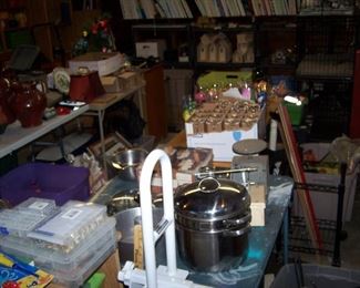 TABLES OF COOKWARE & MISC. IN THE GARAGE