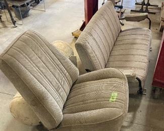 80’s Model Blazer Seats 1 Front and Back Seat. Front Seat is Mounted to a Rim for a Seat In Shop. 