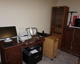 computer desk, monitor, fax machine, lamps