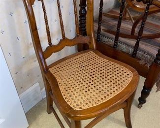 One of several antique side chairs