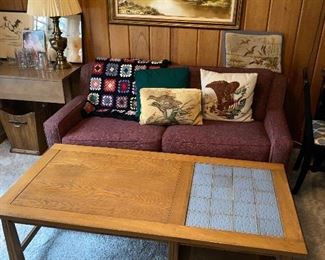 Another great ranch oak table this one having tile in-laid top and rattan shelf