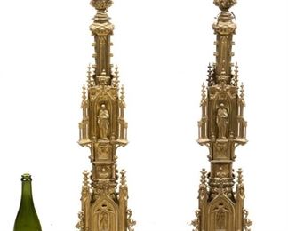 Gothic style altar candlesticks featuring various saints