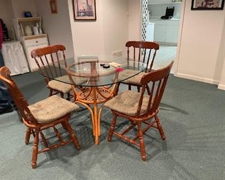 . . . glass dining table and chairs