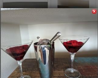Pretty wine colored accent on the martini glasses, includes the shaker as well.