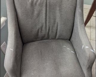 2 grey lazy boy swivel chairs. Great condition. white on the picture is a reflection.