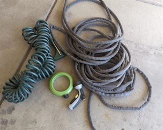 Two hoses, sprinkler, and sprayer.