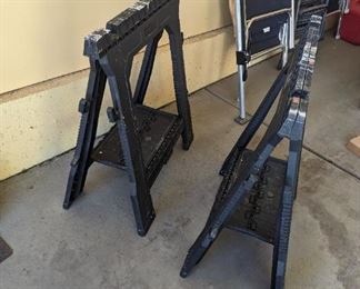 2 saw hard plastic saw horses.