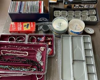 jewelry, blank CDs, jewelry cases, music CDs, computer games, spice containers, film negative transfer, hand weights
