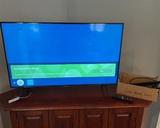NEW TV includes mount, and remote