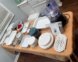 casserole dishes, trivet, large food processor, corning ware, white dishes, cooler, white bowls