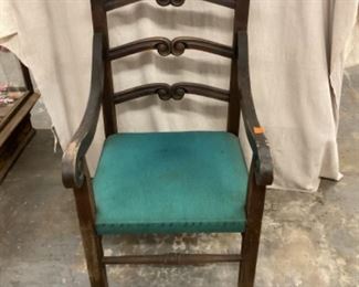 Carved back arm chair