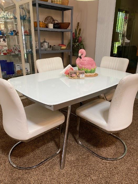 Glass Table and White Leather Chairs