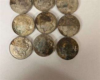 Nine 1921 Morgan Dollars.