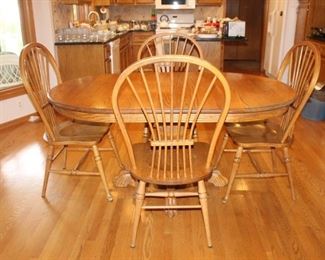 Oak Table with 2 Leaves 12” each 4 Chairs    W-42 D-42