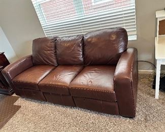 Couch with two end reclining seats