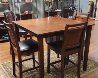 Bar height table and 4 chairs