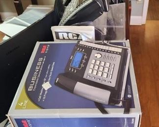 One of several 4 line telephones that can work alone or as a phone system