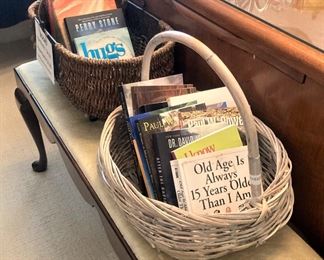 Baskets of books; bed bench