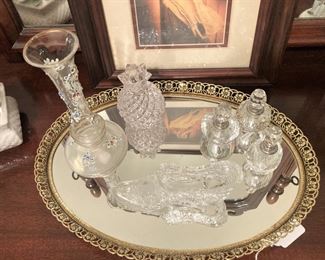 Mirrored tray; vase; perfume bottles