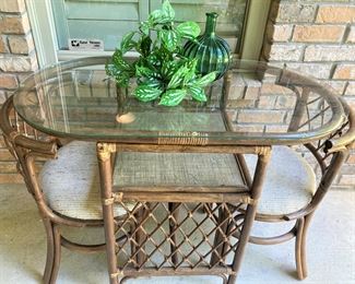 Small bamboo table - chairs tuck in neatly