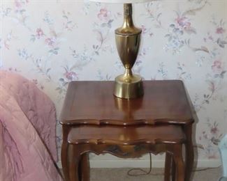 Three nesting tables and brass table lamp.