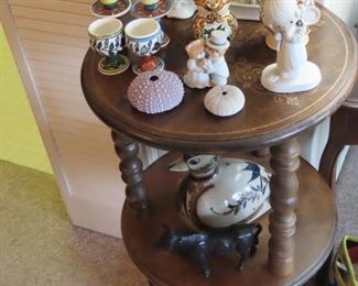 Porcelain birds, Italian egg cups and creamer and sugar, cast iron bull, Mexican ceramic duck.