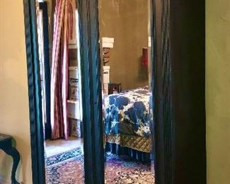 Vintage black Armoire with mirrored doors. There is also a king bed headboard with same beautiful wood details.  