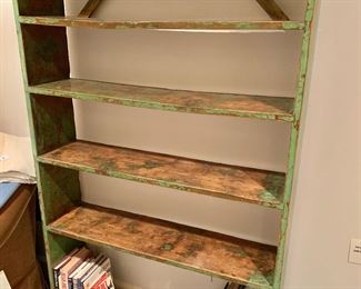 Antique shelf with green paint accents